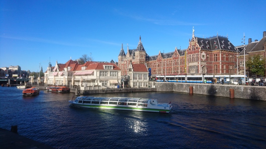 The old coffee house and central station in Amsterdam